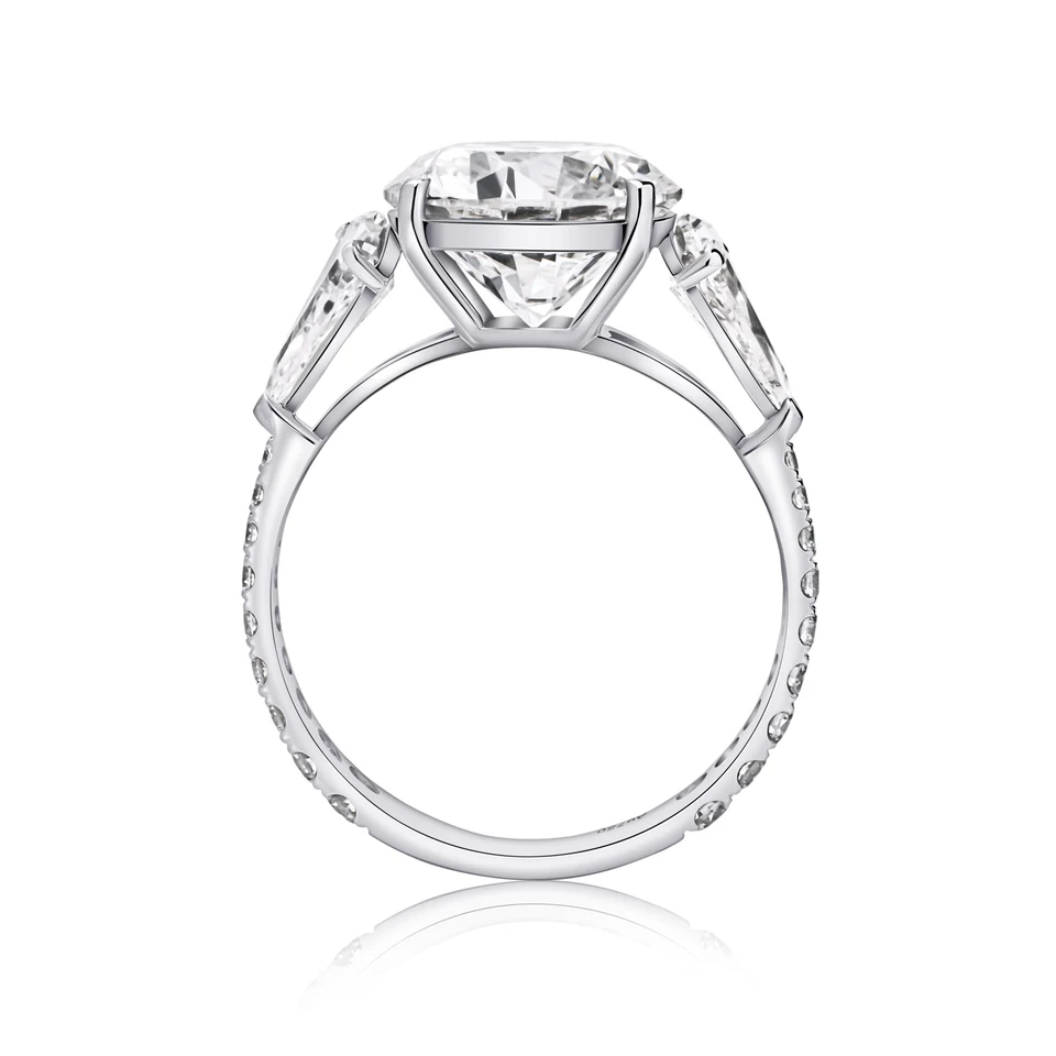 Round & pear three-stone diamond ring