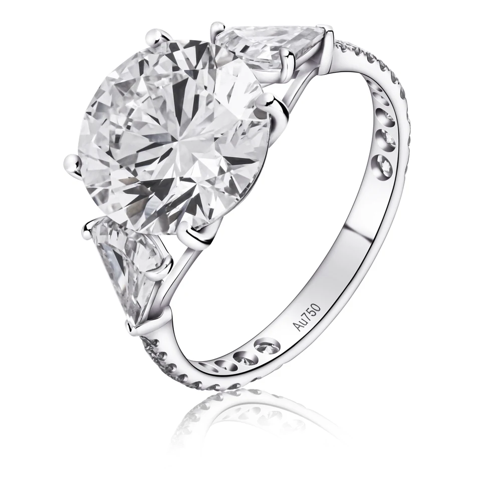 Round & pear three-stone diamond ring